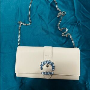 Brand new Jimmy Choo crossbody wallet with blue  jewlels